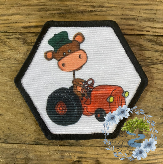 Focal Cow on a tractor 2 1/2” Octagon Trucker Hat Patch